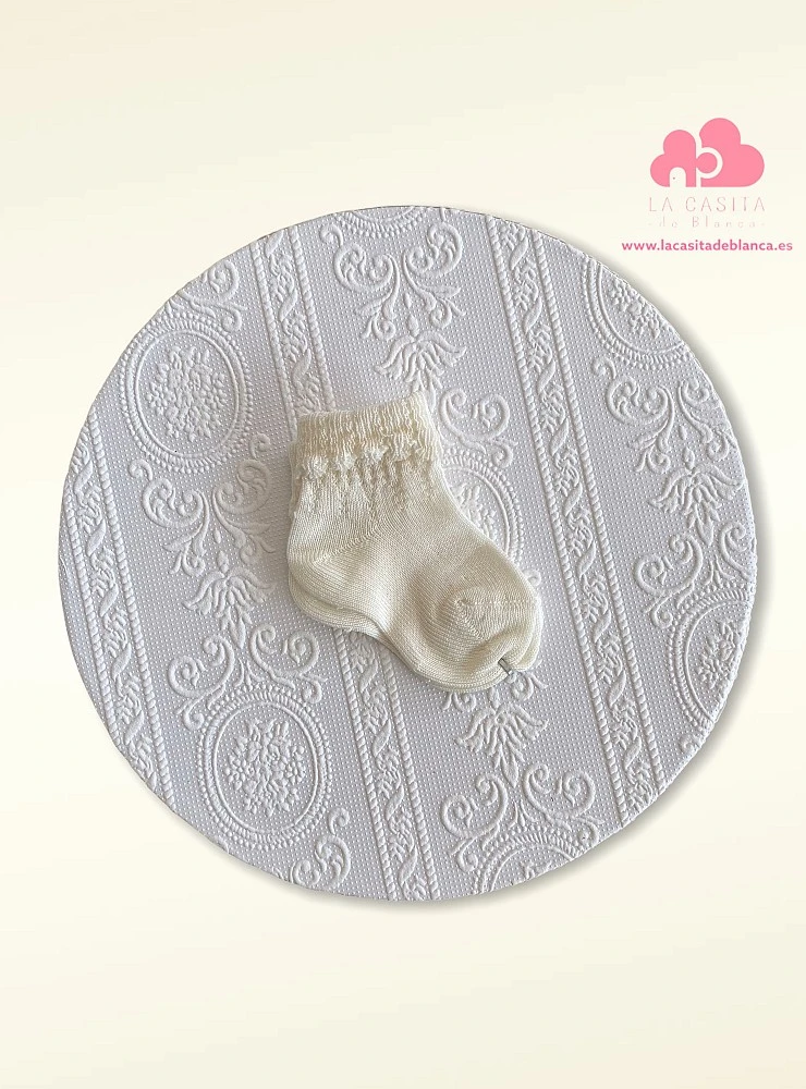 Ankle sock with openwork cuff. Cava color.