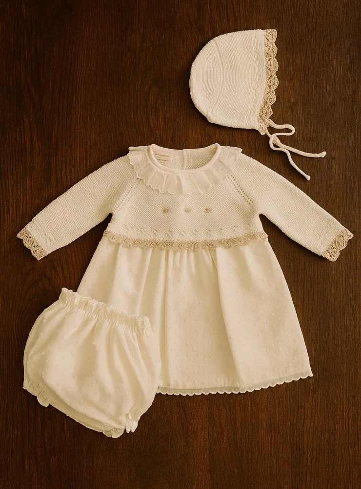 Baby dress with bonnet and cream-colored plumeti bloomers