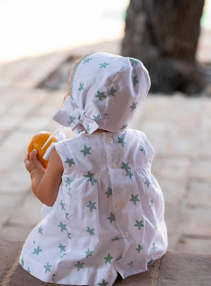 Baby Jesus with bloomers and bonnet with green star
