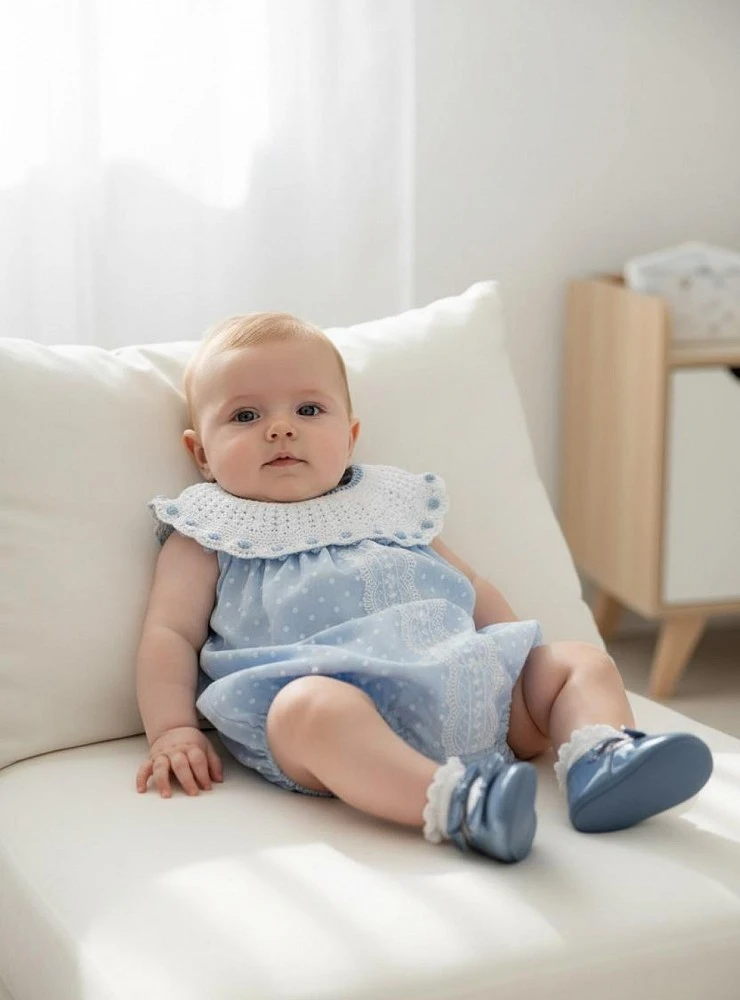 Baby romper. Perfect for christening or special occasions.