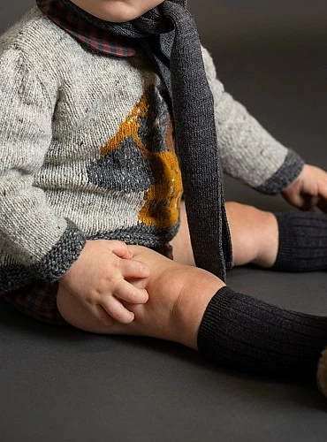 Baby sweater set with puppy and checkered panties.