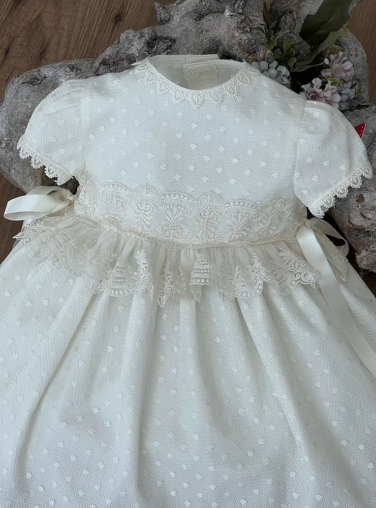 Beige tulle dress and bonnet set.