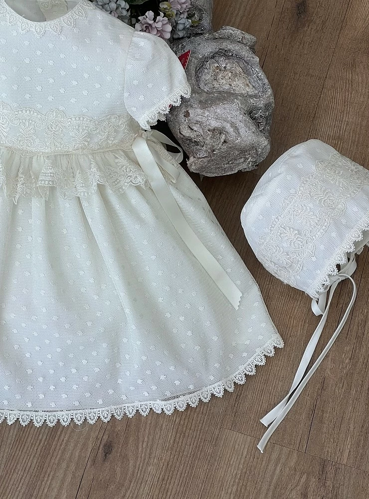 Beige tulle dress and bonnet set.