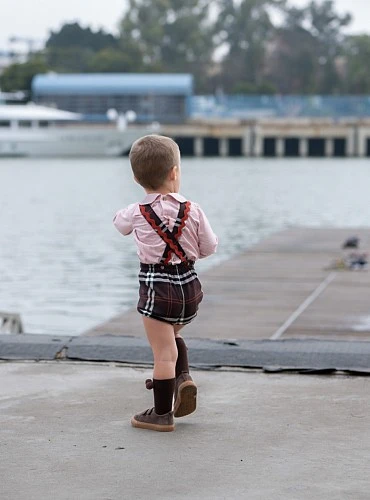 Bellota collection boy's outfit with dungarees and blouse in brown and terracotta tones