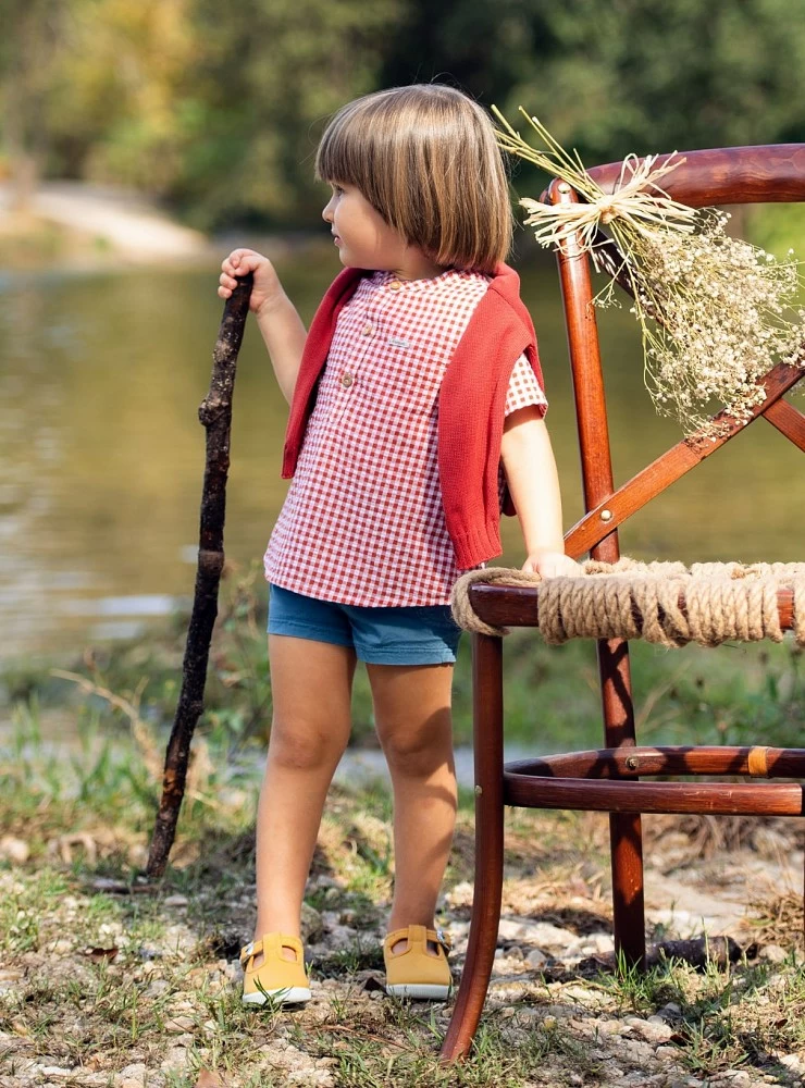 Boy set. Terracotta shirt and blue pants.