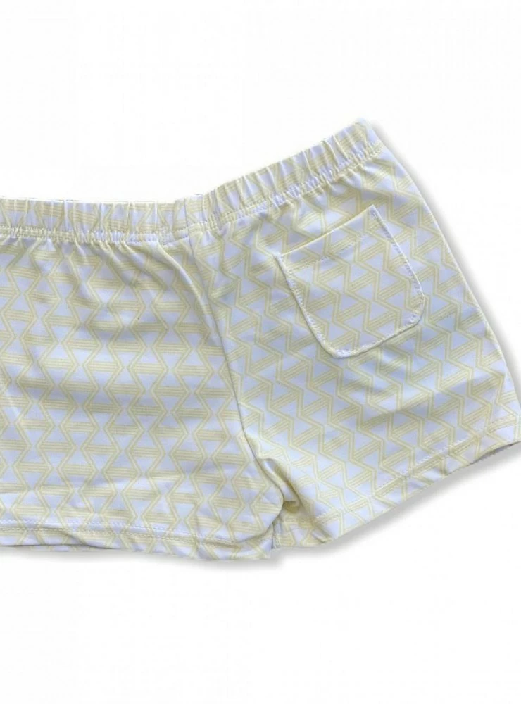 Boy's yellow boxer swimsuit with geometric print