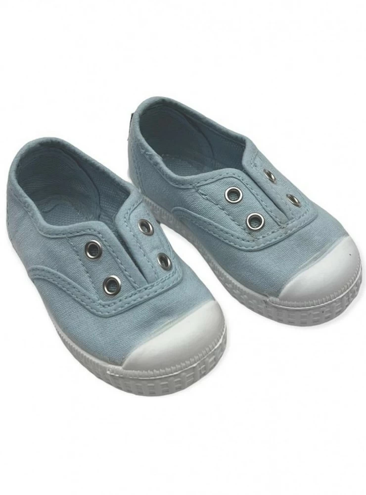 Canvas shoe with aqua green toe. Unisex