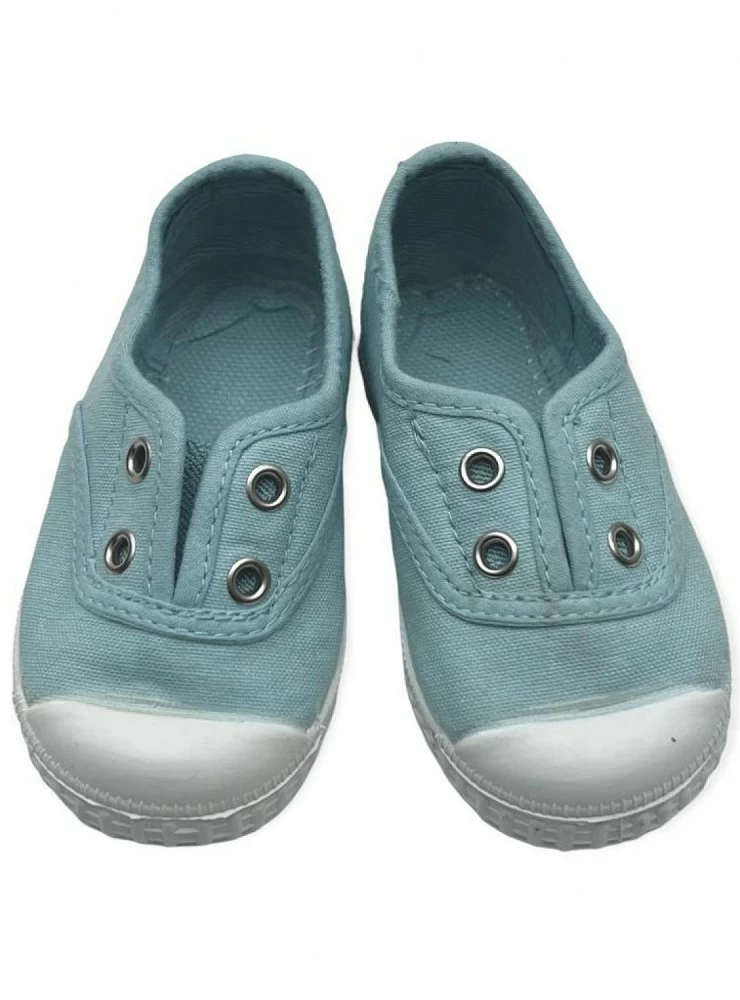 Canvas shoe with aqua green toe. Unisex