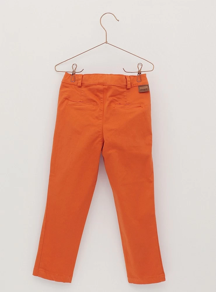 Canvas skinny pants in brick orange. O-Winter