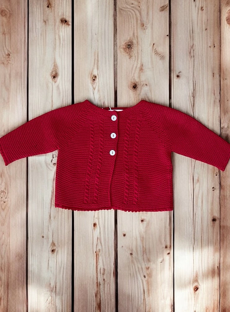 Chaqueta larga en punto liso. Es unisex