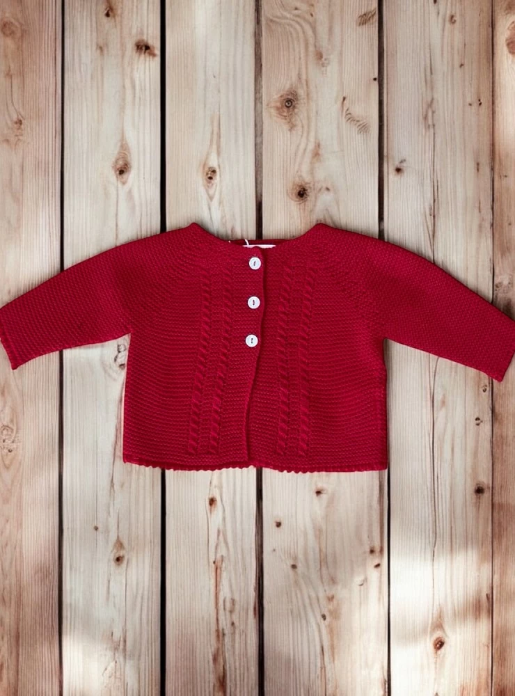Chaqueta larga en punto liso. Es unisex