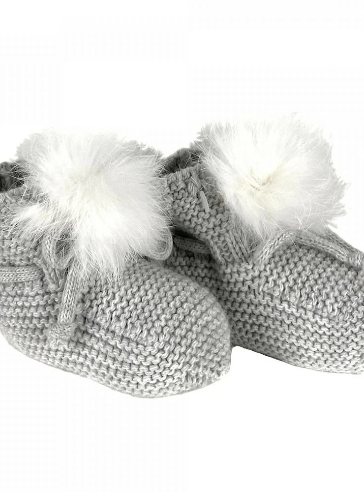 Chubby knit booties with natural fur pompom