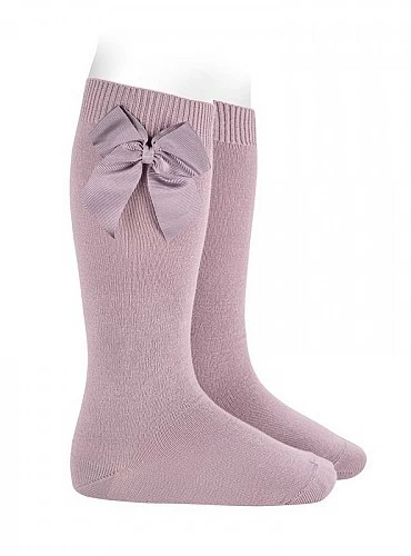 Condor brand knee-high socks or tights, plain knit, with bow. Color 130 Mother of Pearl.