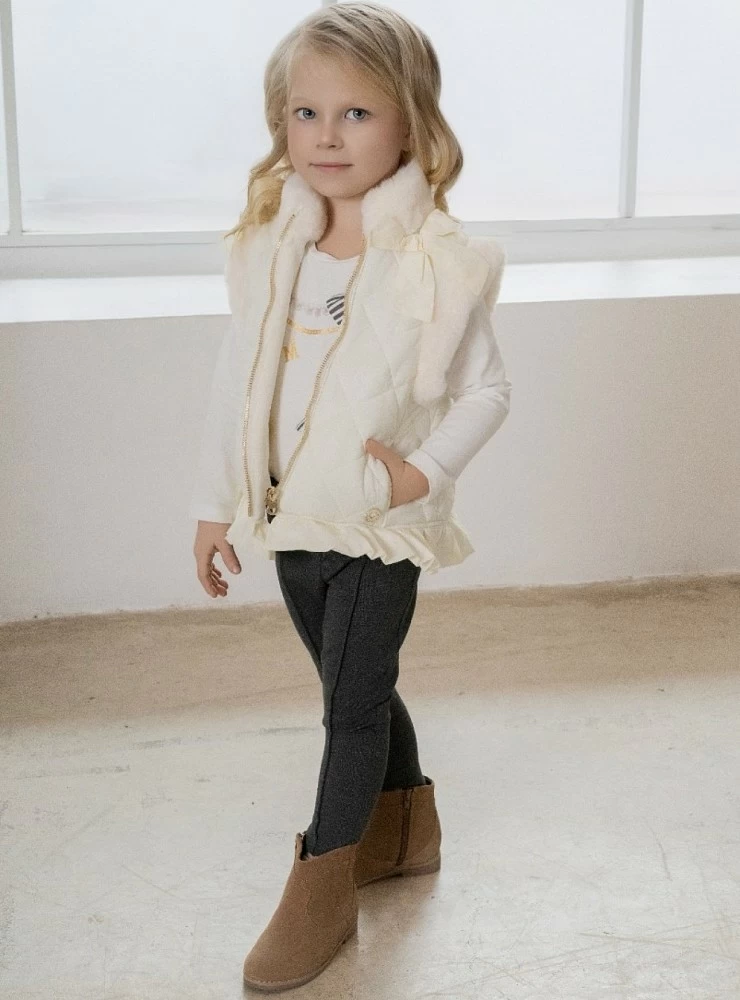Cream-colored quilted vest for girls