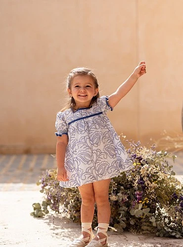 Dress and bloomers set embroidered in royal blue. Salitre Collection