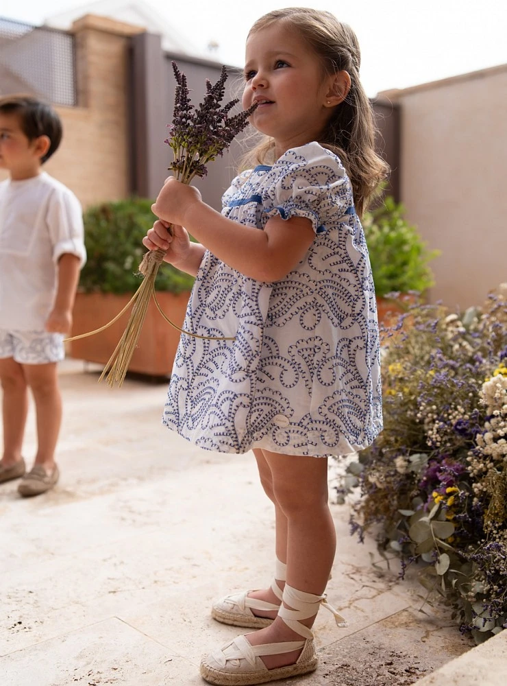 Dress and bloomers set embroidered in royal blue. Salitre Collection