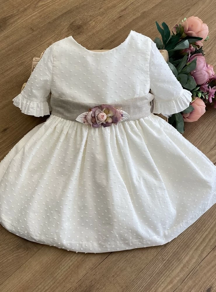 Ecru plumeti flower dress with sand linen bow.