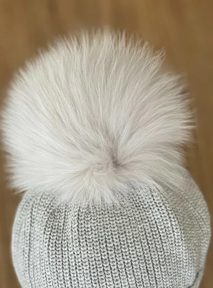 English point beanie with natural fur pompom.