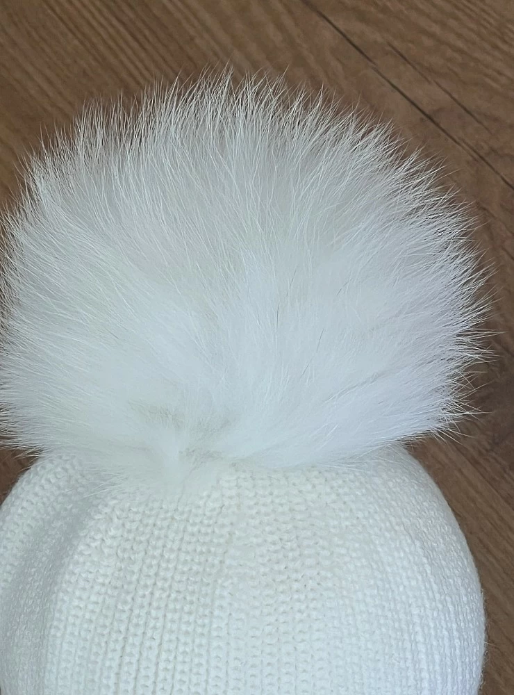 English point beanie with natural fur pompom.