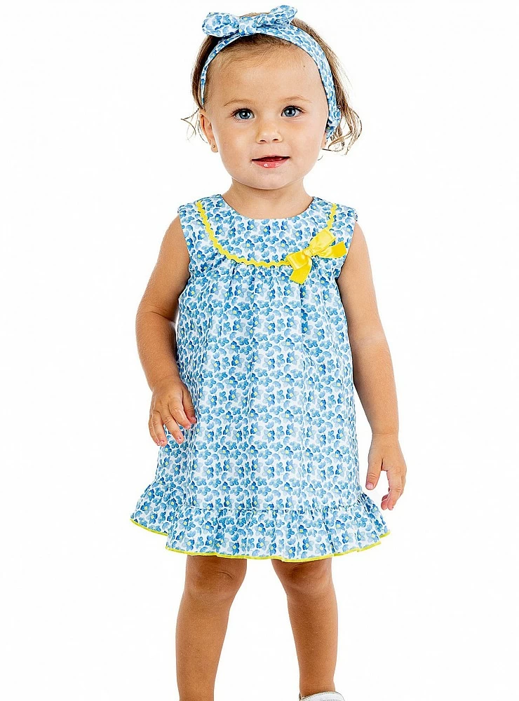 Evasé dress with flounces, blue daisies collection