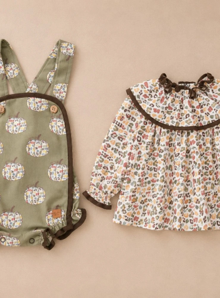 Girl's outfit from the Pumpkins collection with romper and flannel blouse
