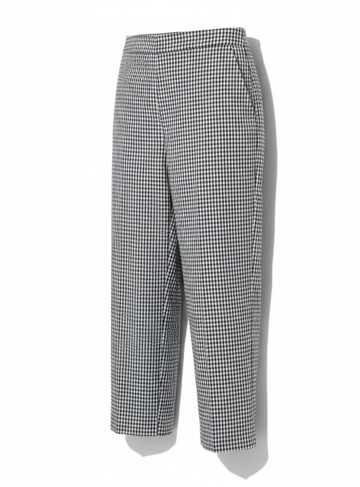 Girl's outfit. Black gingham blouse and trousers
