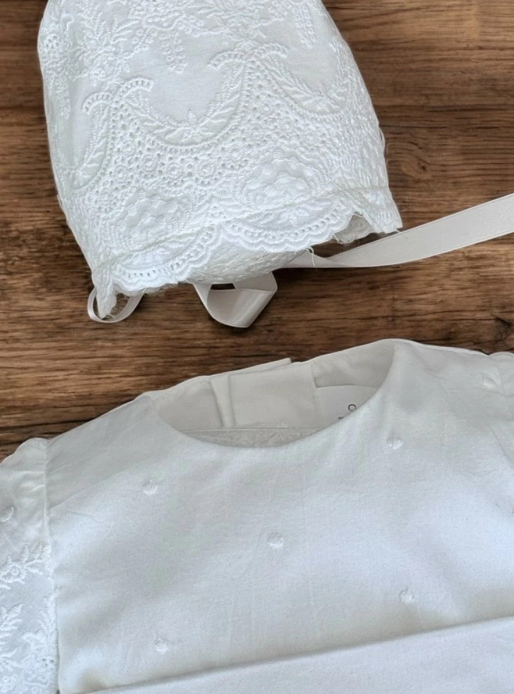 Guipure romper and bonnet for boys from the Dalia collection