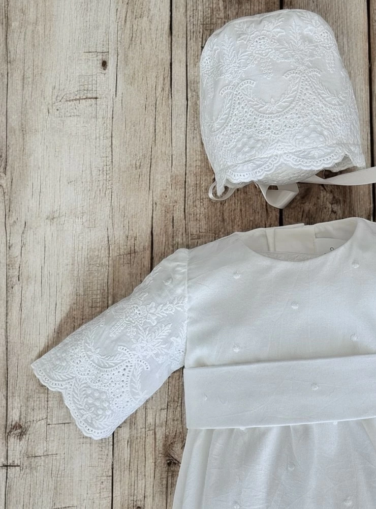 Guipure romper and bonnet for boys from the Dalia collection