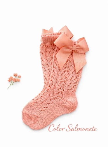 High sock or openwork shoes with drawstring on one side. Various colors