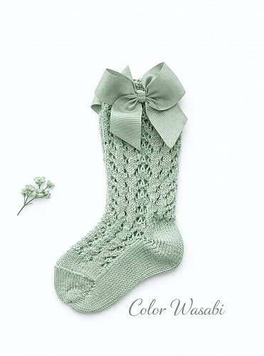 High sock or openwork shoes with drawstring on one side. Various colors