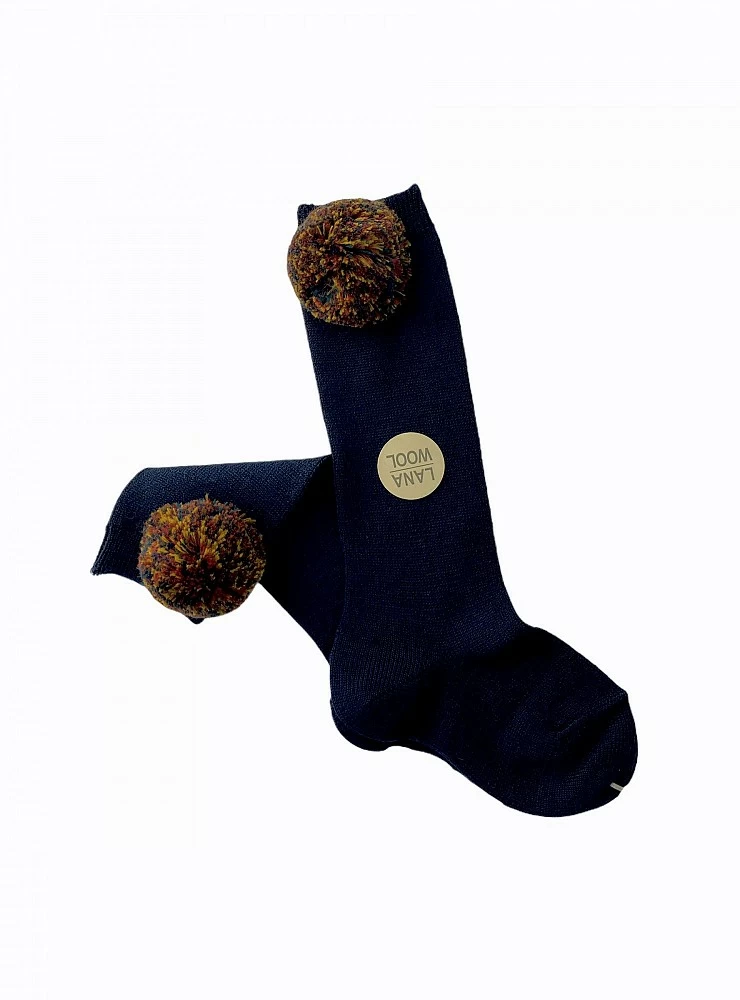 High sock with a two-tone tassel. Various colors