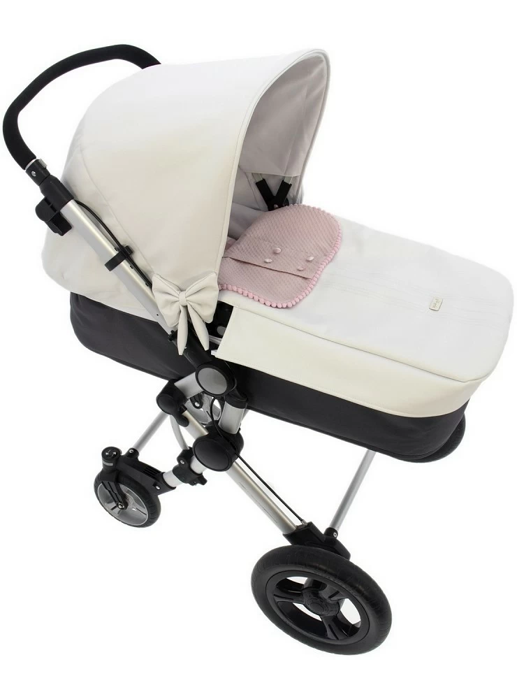 I get three uses for a universal carrycot. White and pink