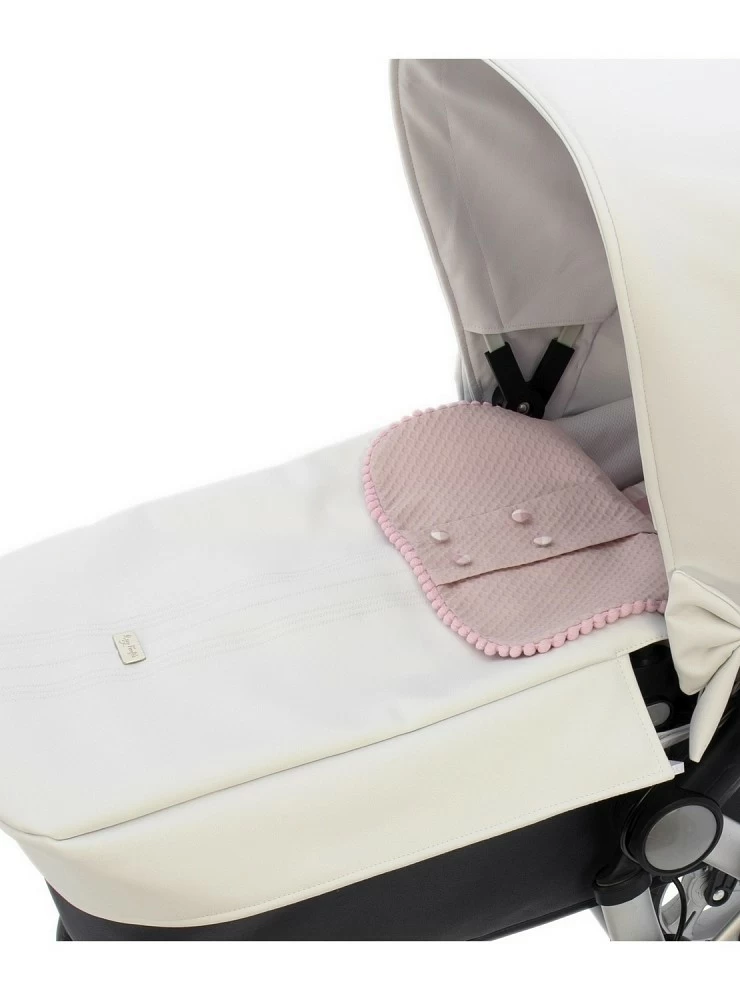 I get three uses for a universal carrycot. White and pink