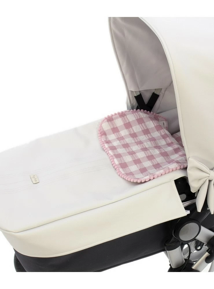 I get three uses for a universal carrycot. White and pink