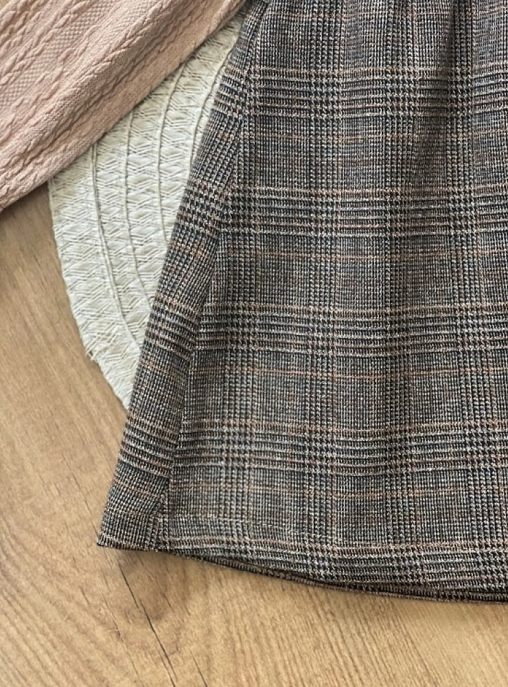 Knit and fabric dress in tan tones