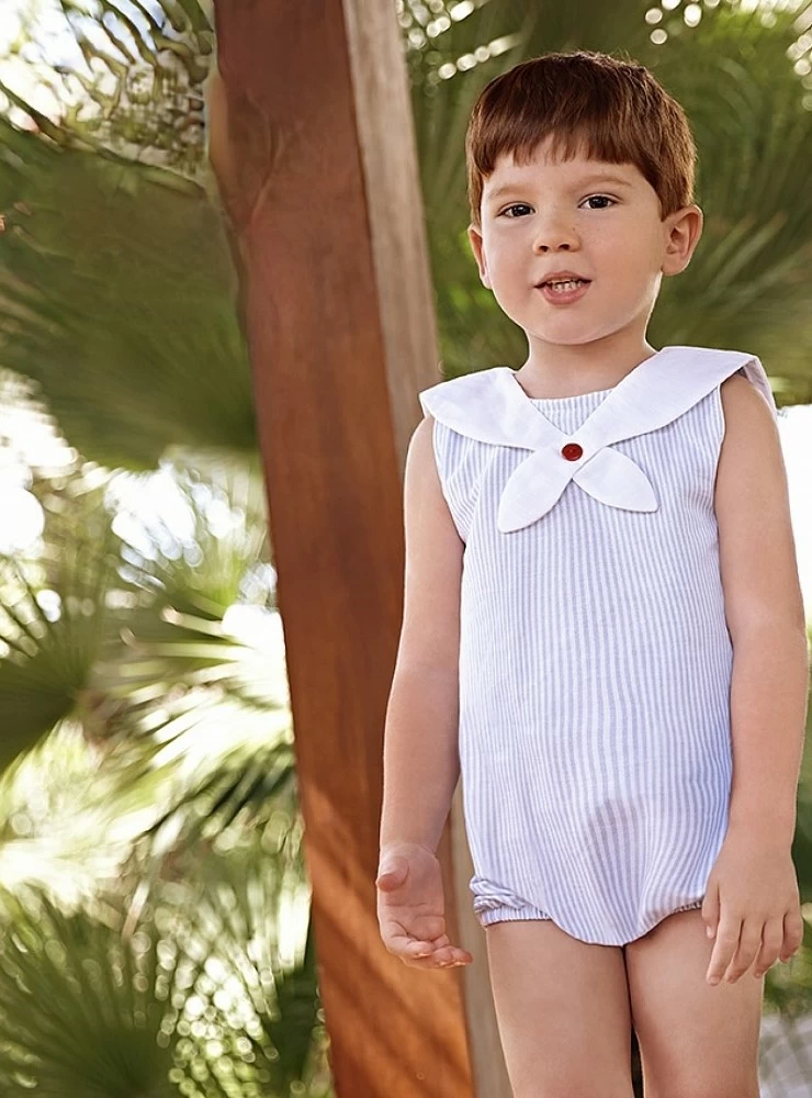 Light blue and white striped sailor romper.