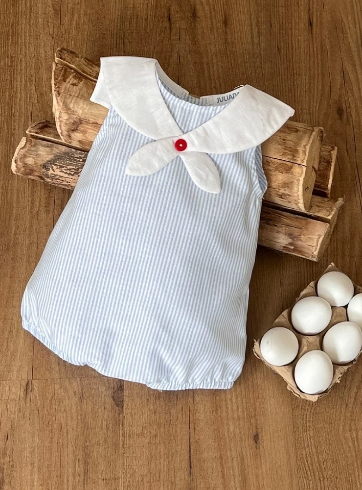 Light blue and white striped sailor romper.