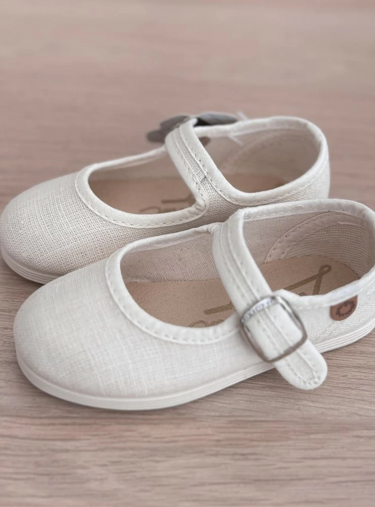 Linen Mary Janes in various colors.