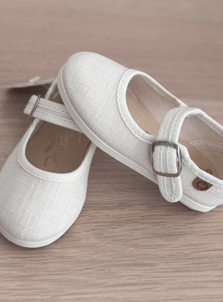 Linen Mary Janes in various colors.