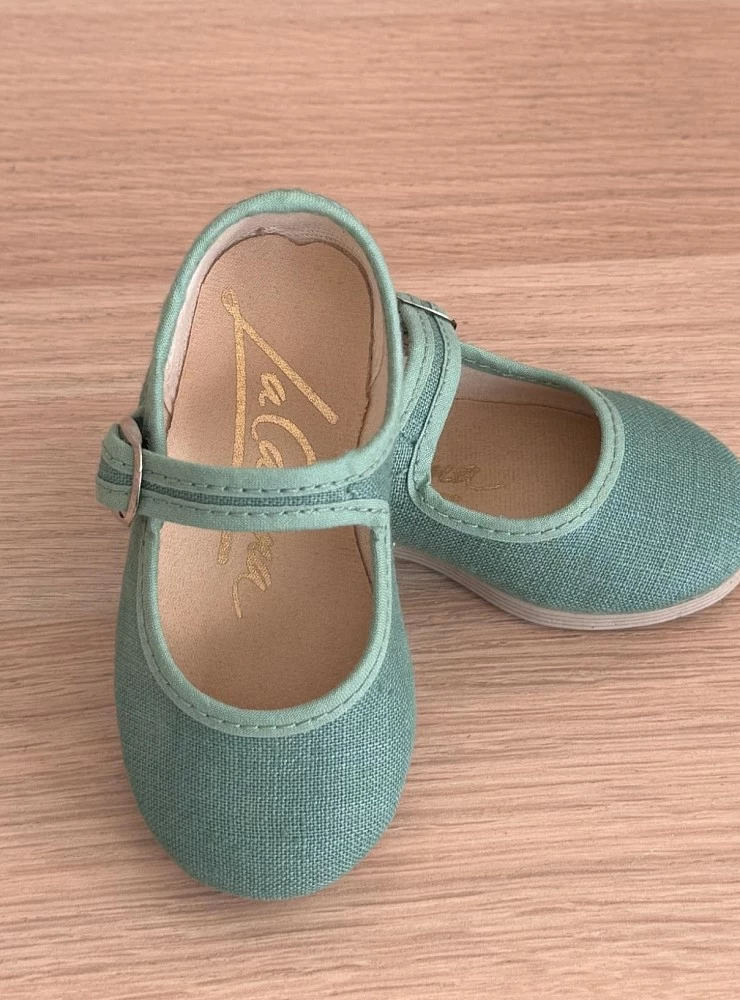 Linen Mary Janes in various colors.