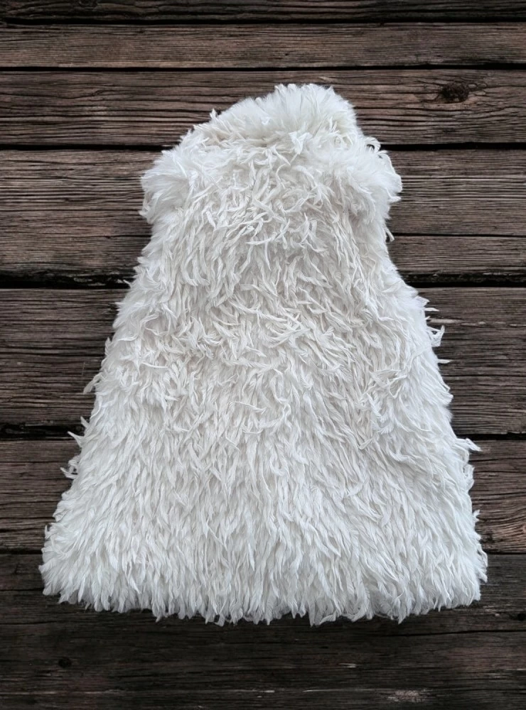 Long beige down vest. For girls.