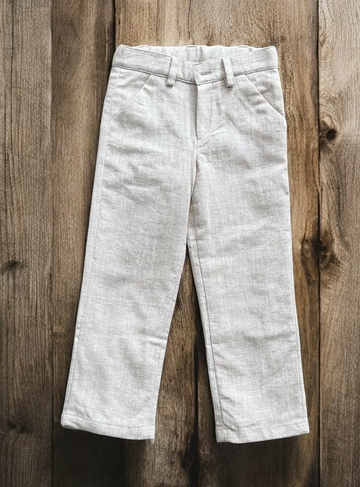 Long sand-colored linen trousers for boys.