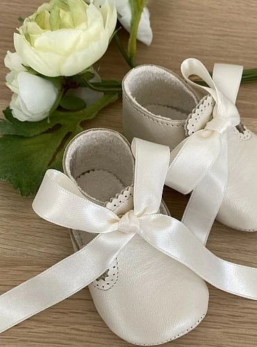 Pearly Principe sandal with satin bow.