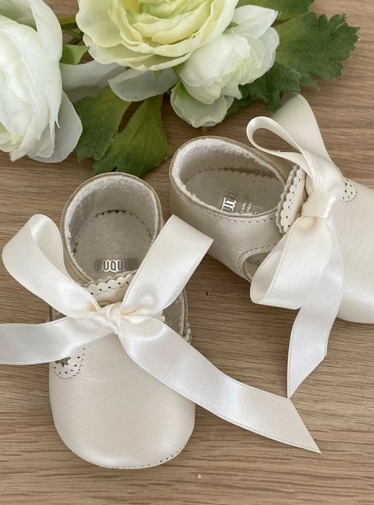 Pearly Principe sandal with satin bow.