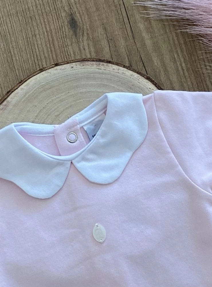 Pelele o pijama para niña rosa con blanco