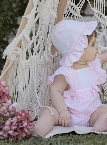 Pink and white baby girl's romper