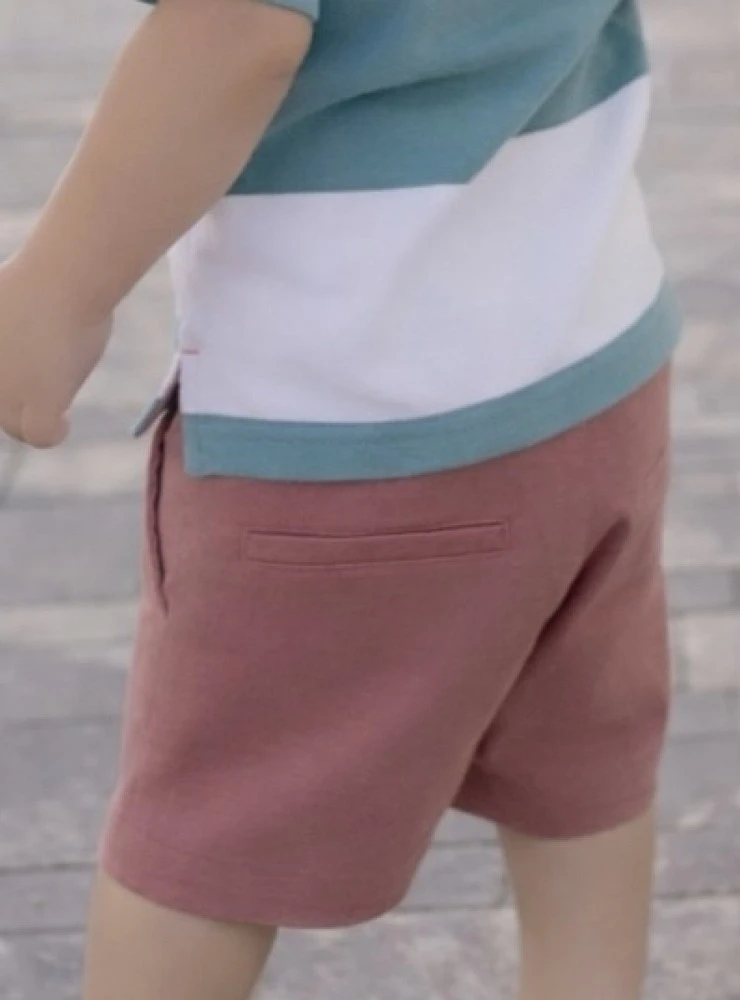 Raspberry-colored baby shorts
