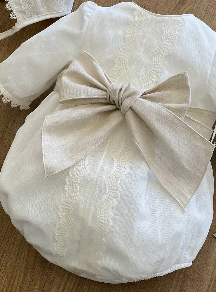 Romper and bonnet set in embroidered tulle with linen bow.