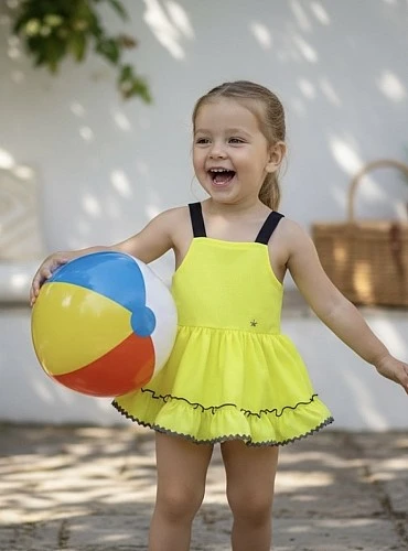 Romper with fluorescent gingham skirt from the Lima Collection