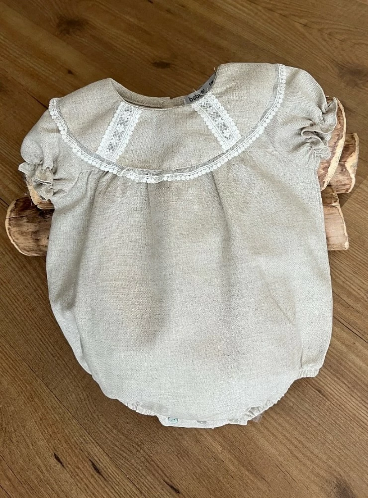 Sand-colored linen unisex romper. Terra Collection